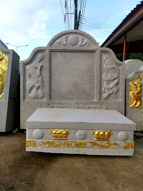 Granite relief headstone before painting